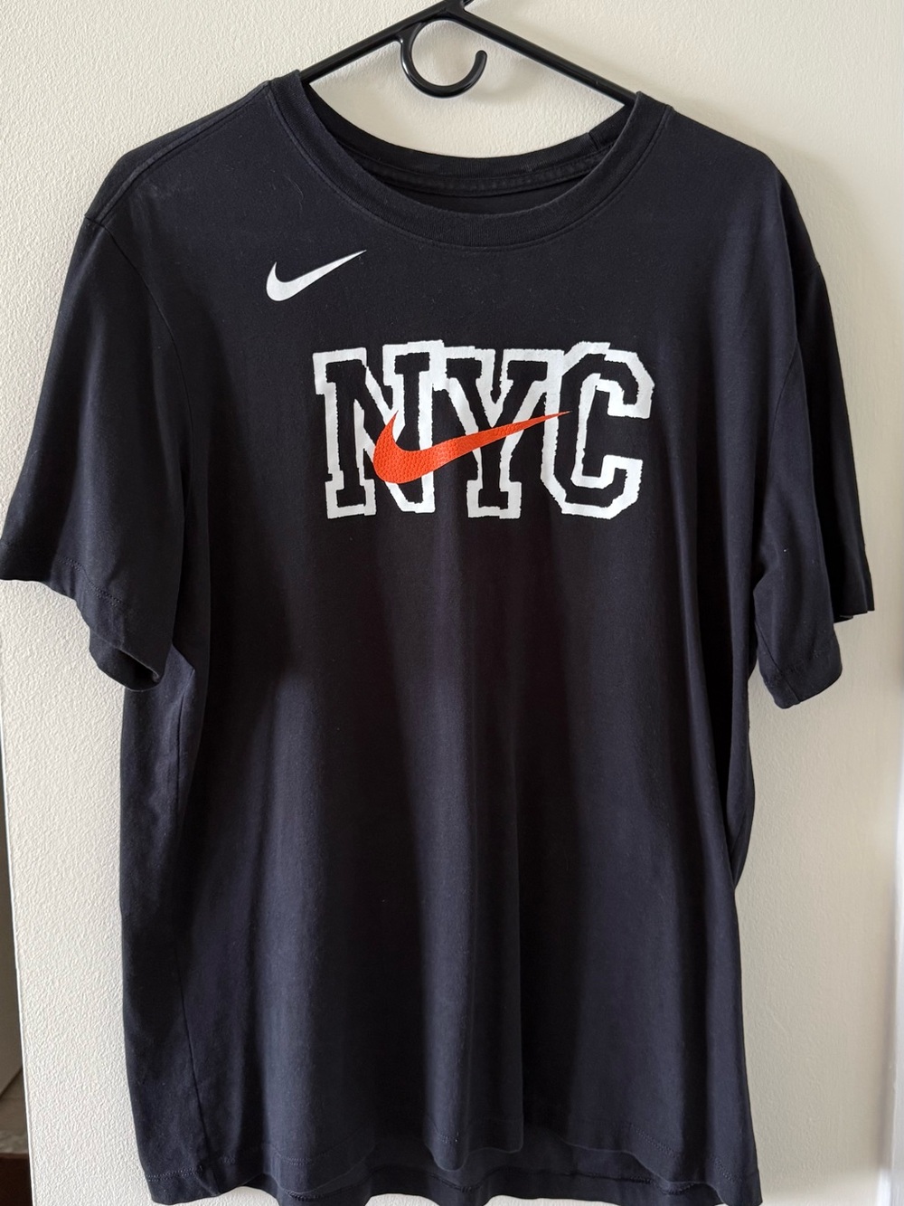 Nike Black NYC T-Shirt with Orange Swoosh and White Logo